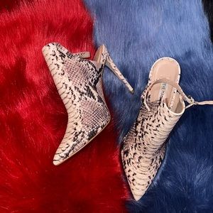 Snake print Steve Madden boots, size 8 1/2, worn for about five hours..